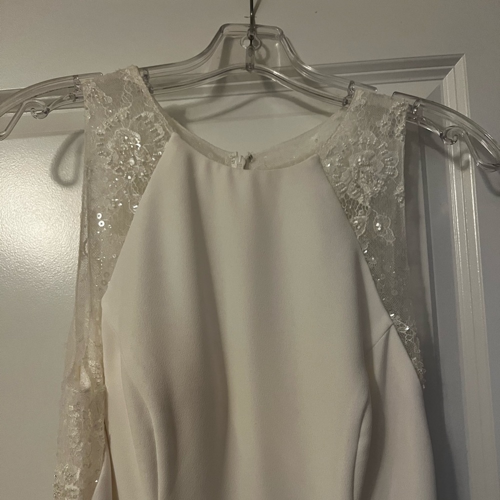 NEVER WORN BEFORE WEDDING DRESS.
